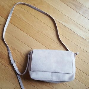 Light pink faux suede bag